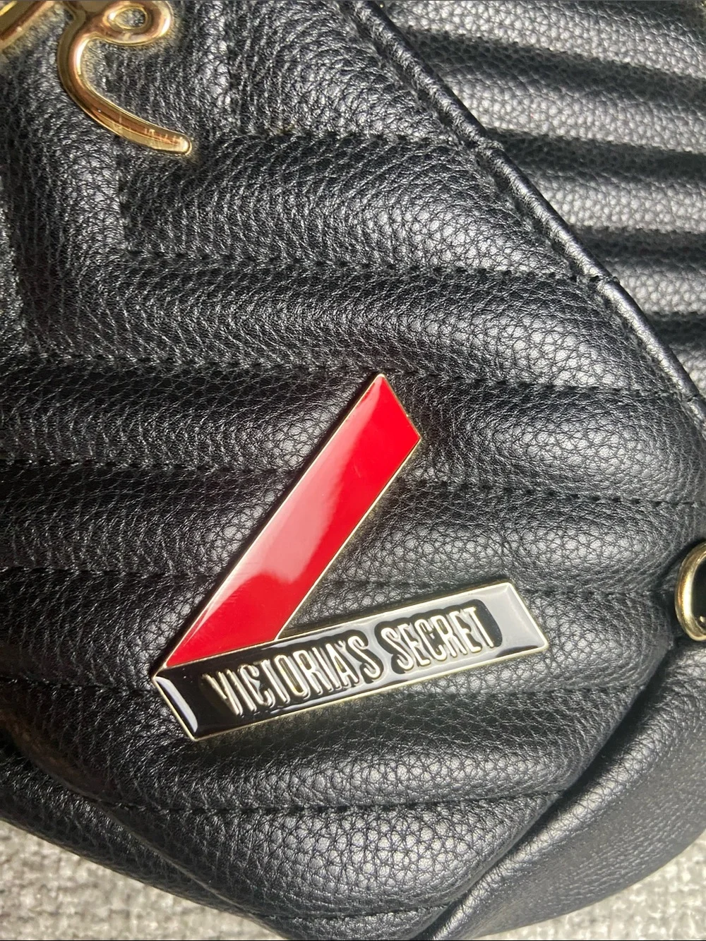 Victoria's Secret Black Quilted Mini Backpack with Gold Accents and Red Detail